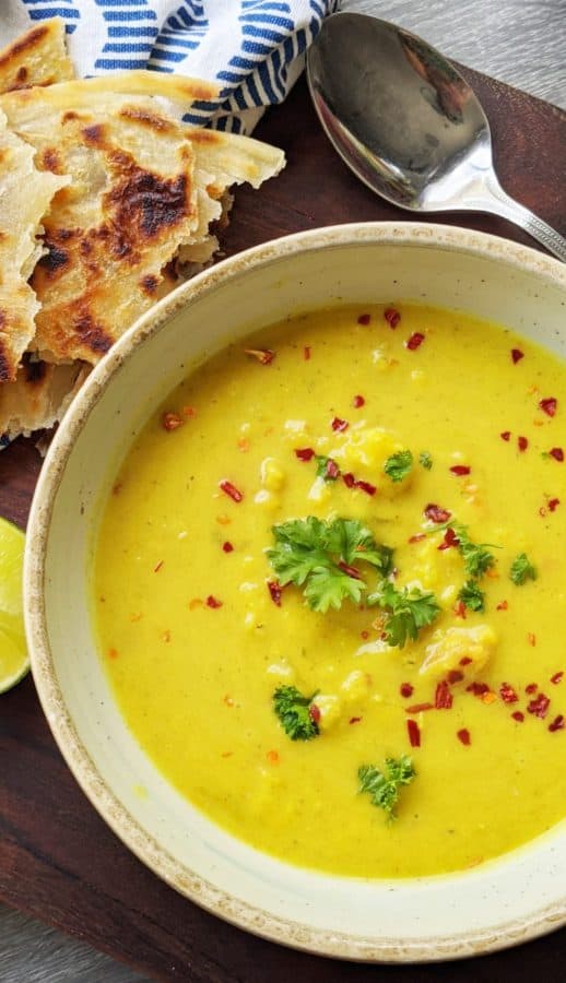 Cauliflower, coconut and orange lentil soup budget vegan recipe by The Posh Pescatarian.