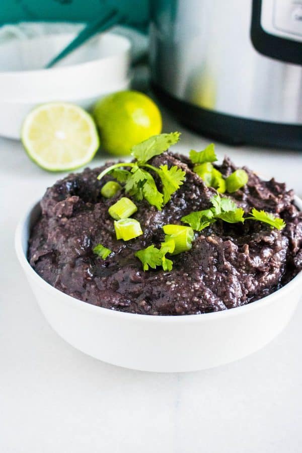 Short on time and money? Try this Refried Black Beans recipe if you are a vegan on a tight budget.